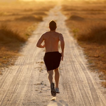running man running outside on dirt road