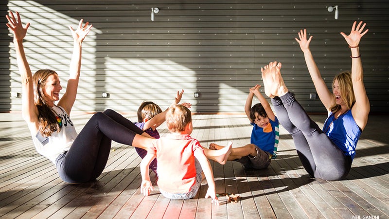 Leah Cullis and friends demonstrate Boat Pose. Leah Cullis and friends demonstrate Boat Pose.