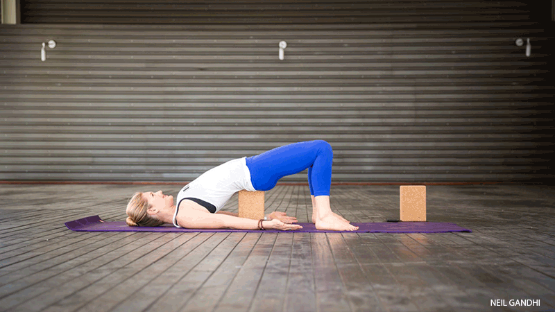 Leah Cullis performs Supported Bridge. Leah Cullis performs Supported Bridge, setu bandha sarvangasana