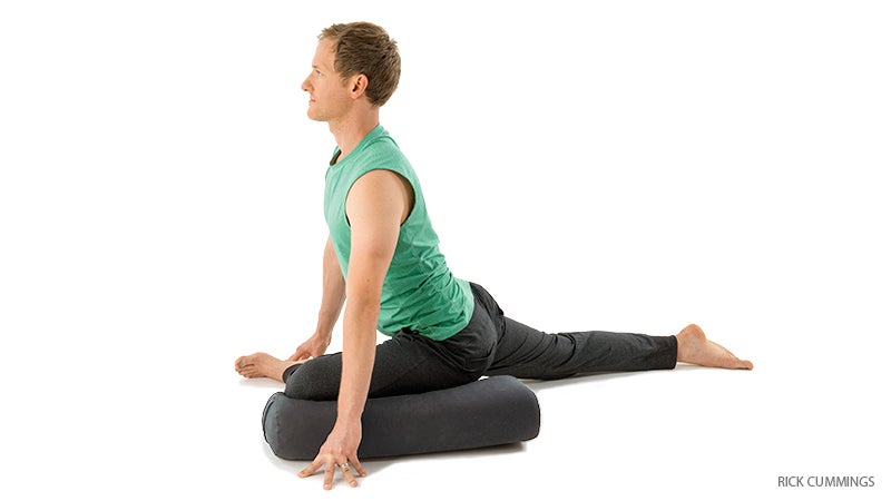 YP_282_0240_FNL-PIGEON-MODIFICATION jason crandell, half pigeon pose with bolster assist, eka pada rajakpotasana