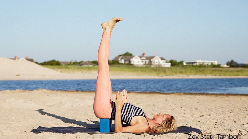 Colleen Saidman Yee performs Legs-Up-the-Wall Pose. Colleen Saidman Yee performs Legs-Up-the-Wall Pose.