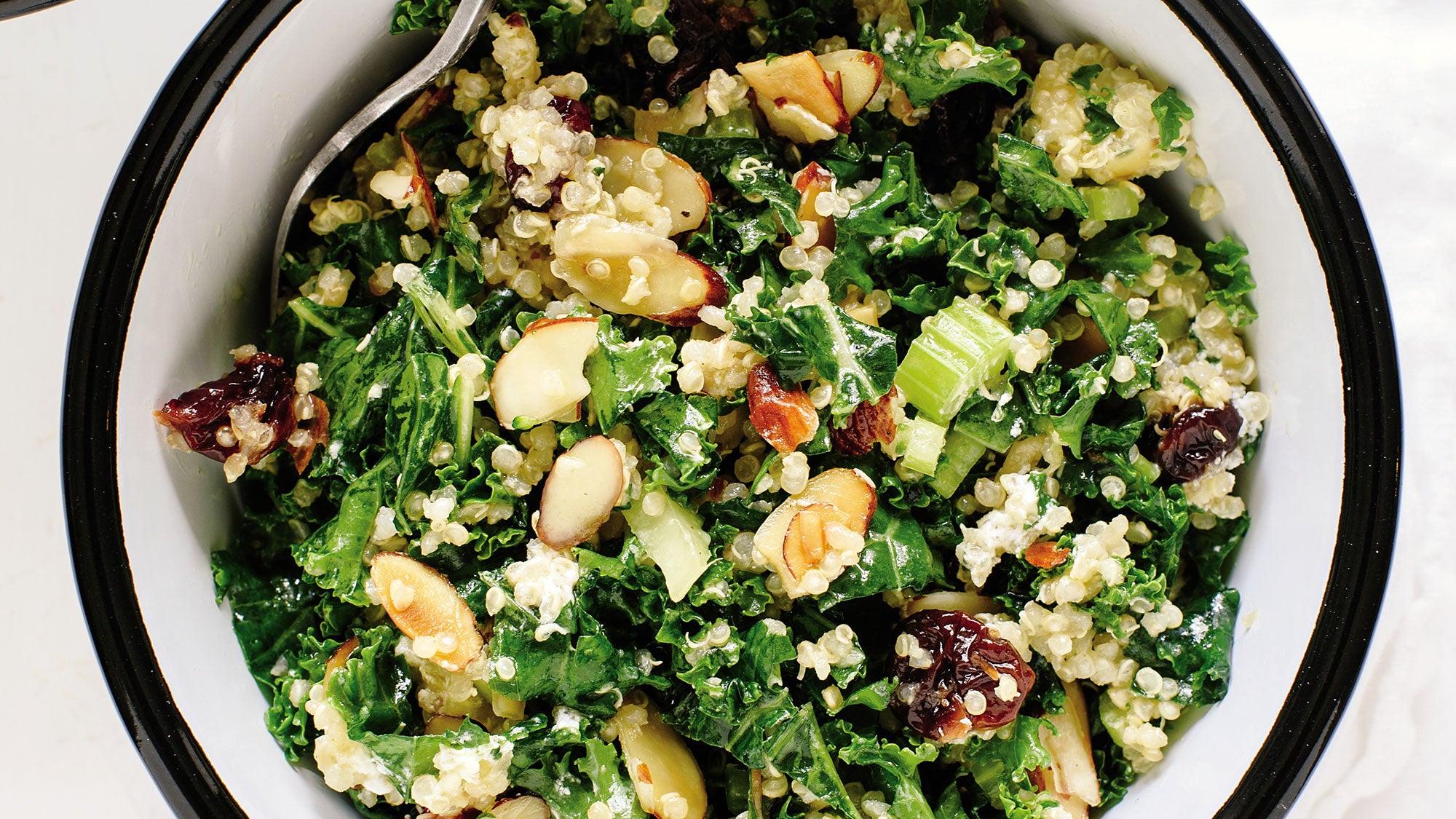 073620_kale-quinoa-salad_8563 Kale and Quinoa Salad with Crisp Celery, Plumped Cranberries, and Lemon Dressing