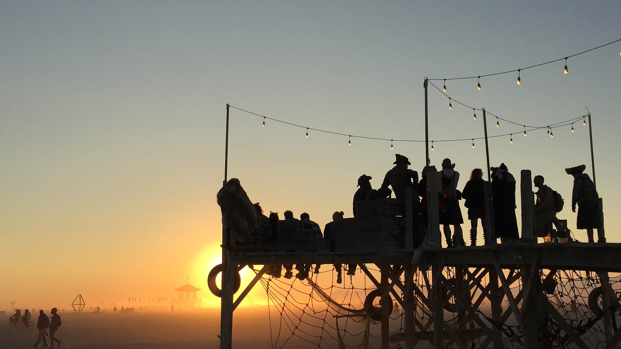 burning-man-group-sunset None