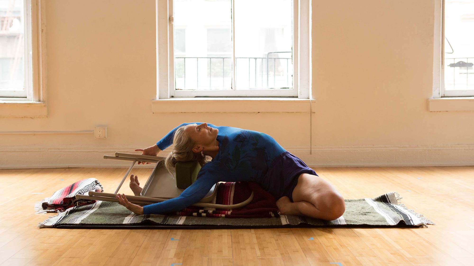 Parivrtta-Janu-Sirsasana-with-chair-Joe-Arcidacono-3 None