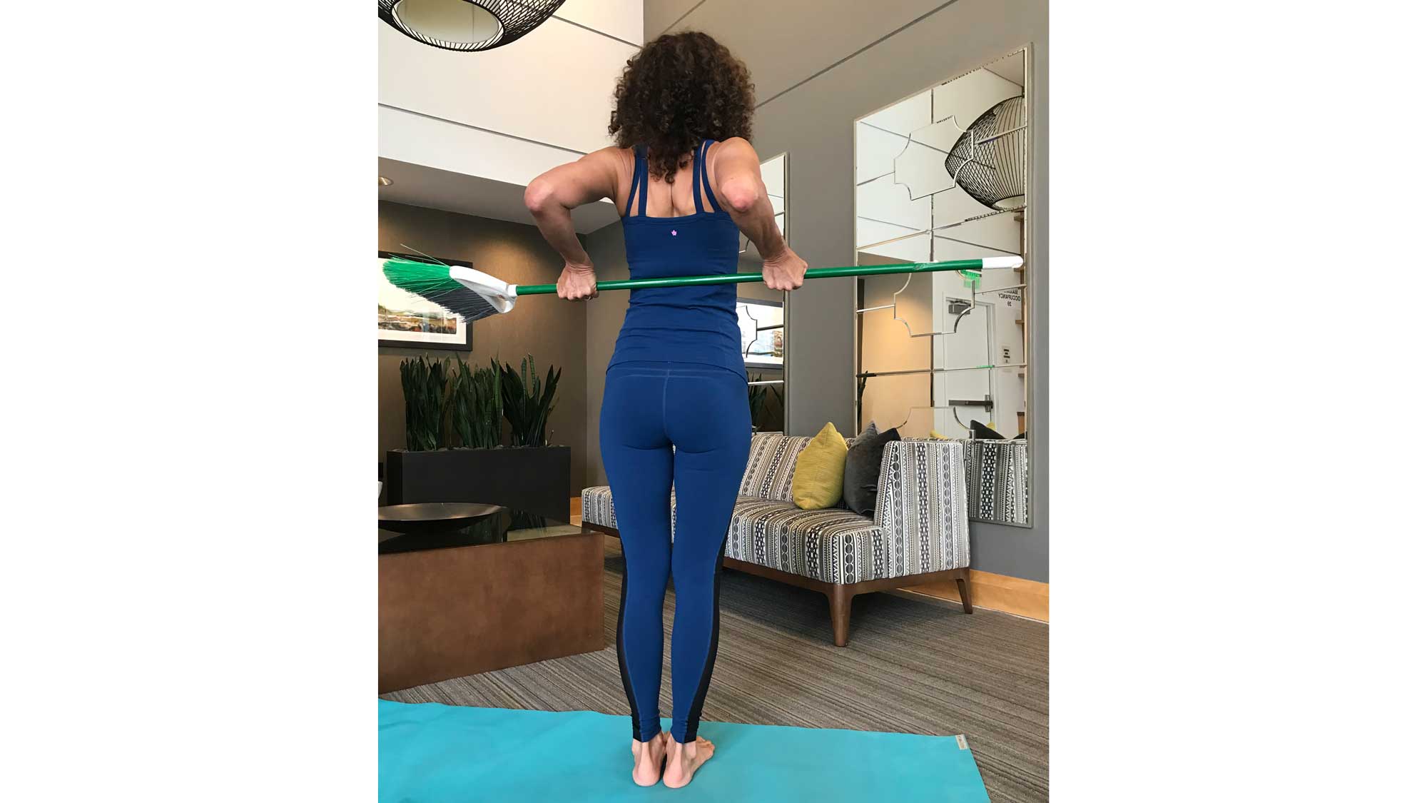 shoulderstretchwithbroom16x9 Shoulder stretch with broom