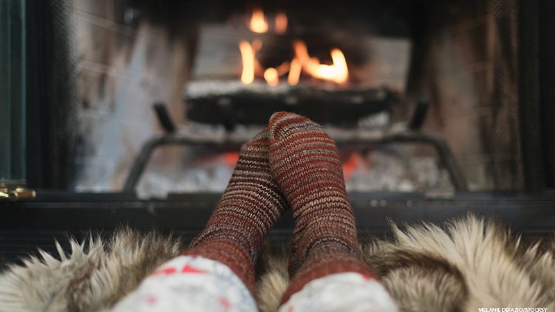 feet by a fire, calm, winter, holidays feet by a fire, calm