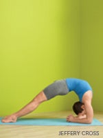 This pose is exactly the opposite of sitting: It places the hips into extension and strengthens all of the deep and larger buttock muscles. What’s more, this posture also helps you figure out which side of your glutes is stronger. The more you practice it, the better each buttock will become at supporting its counterpart.How to Rest on the ground with your arms on the floor. Unlike the classic version of Bridge, keep your arms and shoulders passive so that they don’t compensate for your gluteal strength. Place your feet parallel to each other and a few inches from your butt so that when you lift up, your shins are perpendicular to the floor. Activate all of your deep-core muscles at once to keep the natural curves in your spine intact. Then, activate your glutes and raise your pelvis off the floor without allowing your lumbar to curve into a backbend. The key is to reach full extension, creating a diagonal line from your shoulders to your knees, without feeling any discomfort in your back. If you feel a pinching sensation or any soreness in your lower back, reinforce the tension in your abdominals and gluteals and lower your hips until you find an angle that works. Lift your left foot off the ground 1 inch and hold the pose for 4–8 breaths without any wavering or collapsing in your pelvis/hips. (If this is too much, just lift your heel.) Switch sides. Then lie flat on your back to rest. Repeat for a total of 3 complete rounds.Learn more about Bridge Pose