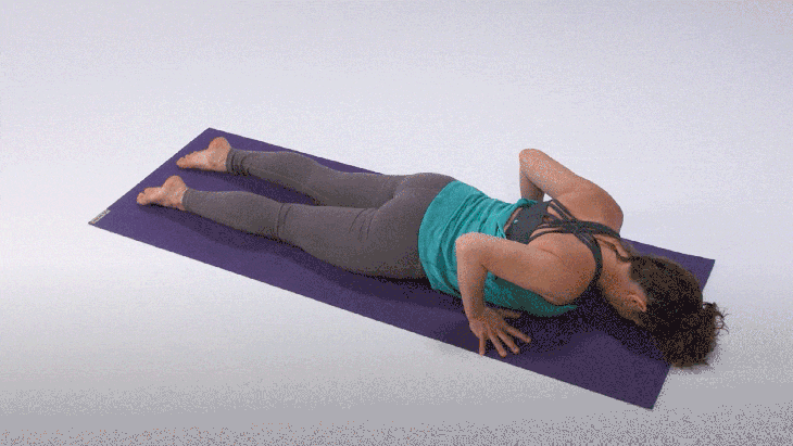 Woman demonstrates Bow Pose