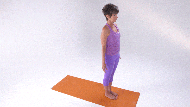 Woman demonstrates Revolved Triangle Pose