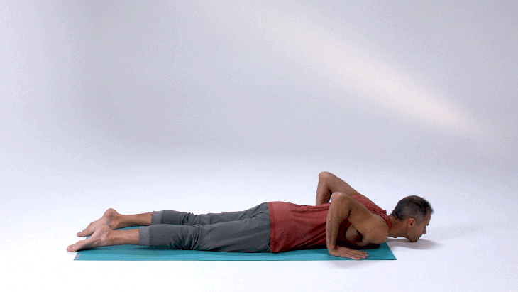 Man demonstrates Upward-Facing Dog Pose