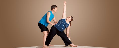 jason crandell teaching triangle pose