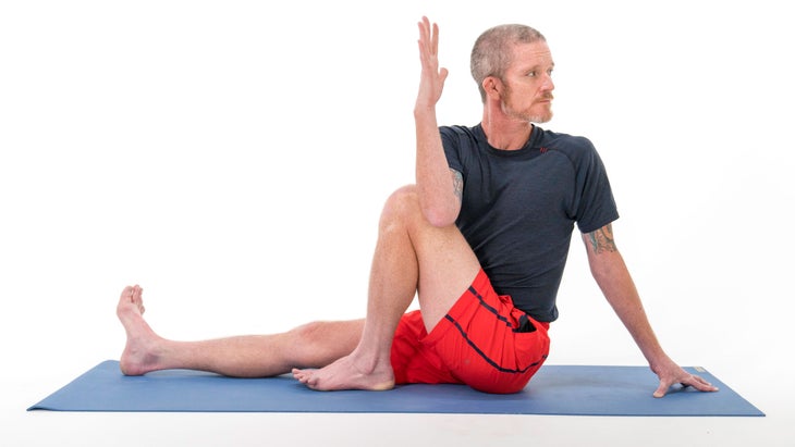 Man demonstrates Pose Dedicated to the Sage Marichi III