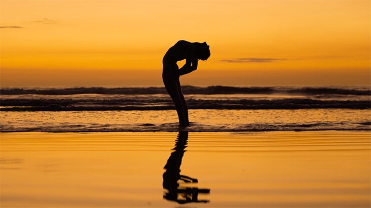 Shiva Rea performs Standing Anahatasana. dealing with anger, Shiva Rea performs Standing Anahatasana.