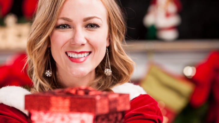 woman at christmas time face celebrate gift woman at christmas time face celebrate gift
