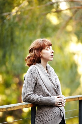woman-on-bridge-in-the-fall