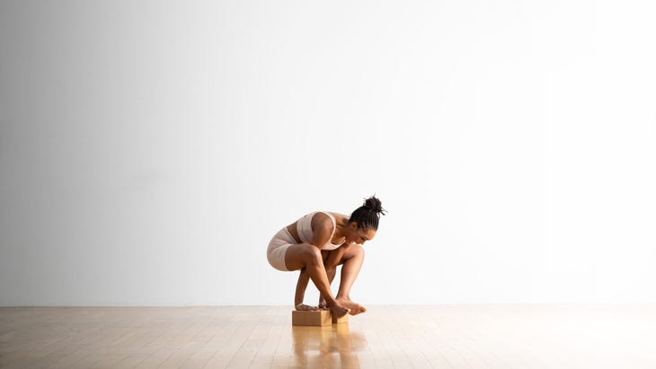 Shoulder-Pressing Pose (Bhujapidasana)