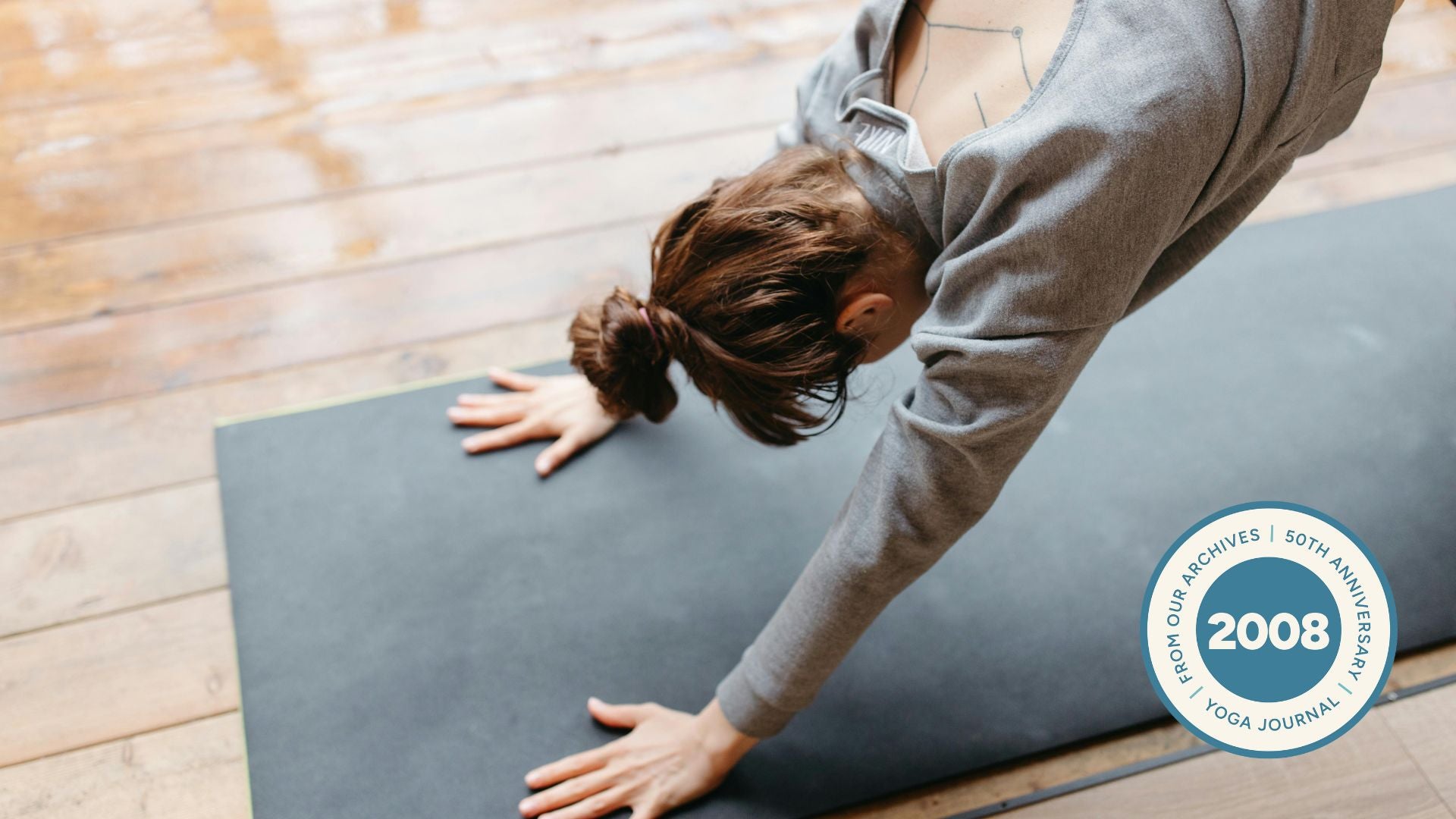 Image of woman in Downward-Facing Dog.