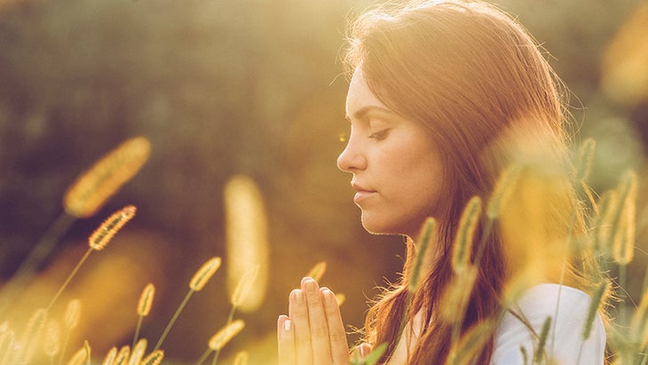 Young-Woman-Practicing-Yoga-Outdoors-000076471895_Medium be vulnerable, meditation, field, outdoor yoga, woman meditating