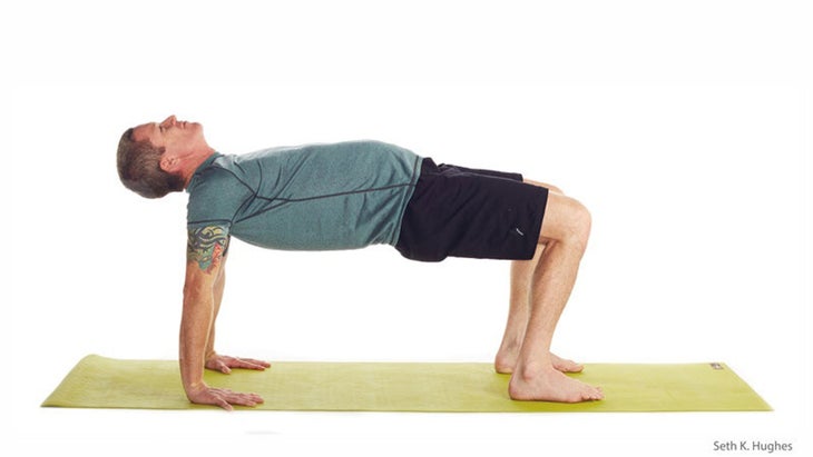 Man doing reverse table top