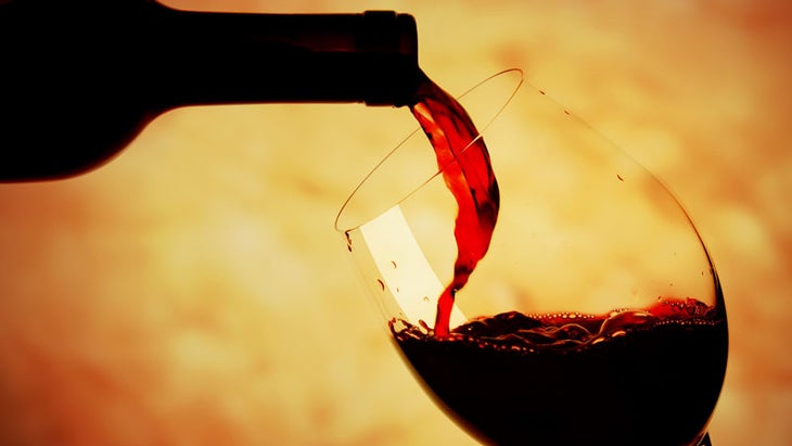 pouring glass of wine pouring glass of wine