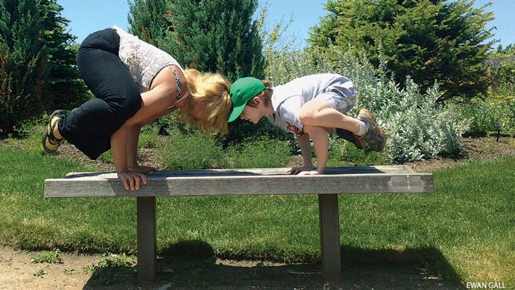 mother son yoga crow pose family