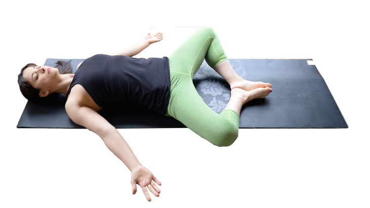 Two Fit Moms in Reclining Bound Angle Pose Two Fit Moms in Reclining Bound Angle Pose