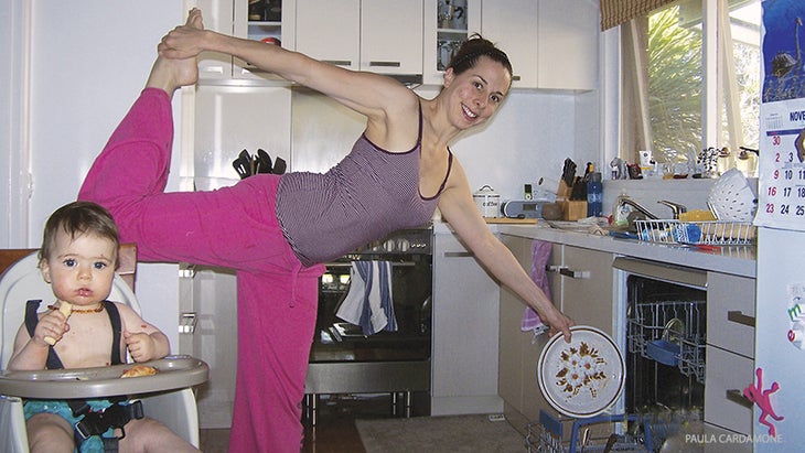 Woman doing Dancer in Kitchen Woman Doing Dancer in Kitchen
