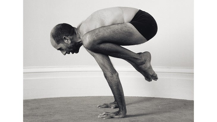Eddie Modestini performs Crane Pose. Eddie Modestini performs Crane Pose.