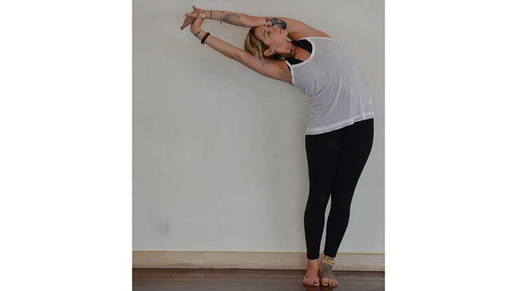 Stefanie Eris in Sidebending Mountain Pose, tadasana