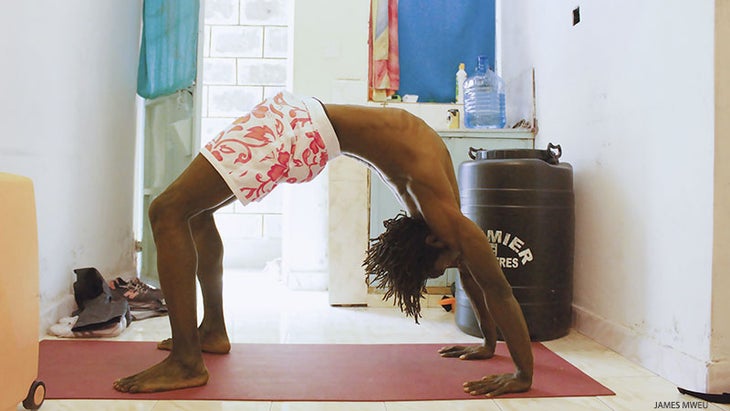 Kevin Ogutu, wheel pose, urdhva dhanurasana, home practice