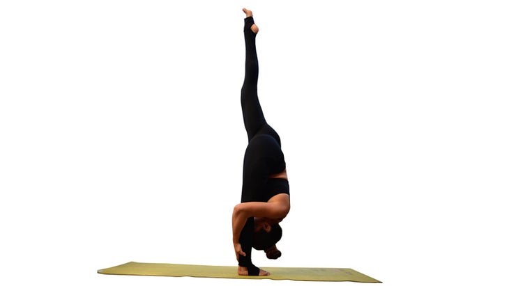 Two Fit moms perform Standing Split. Two Fit moms perform Standing Split.