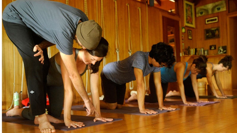 Eddie Modestini teaching a vinyasa yoga class