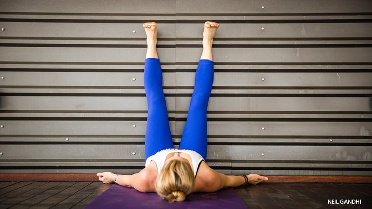 Leah Cullis performs Legs-Up-the-Wall Pose. Leah Cullis performs Legs-Up-the-Wall Pose.