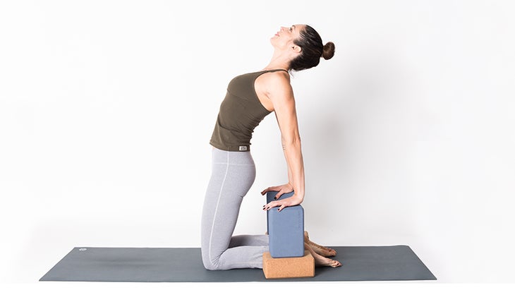 supported camel pose supported camel pose