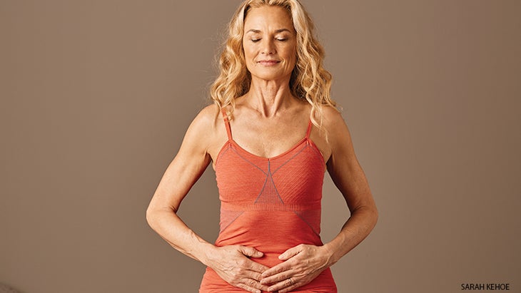 colleen and rodney yee legs up the wall posehands on naval mudra, colleen saidman yee, reiki colleen and rodney yee hands on naval mudra