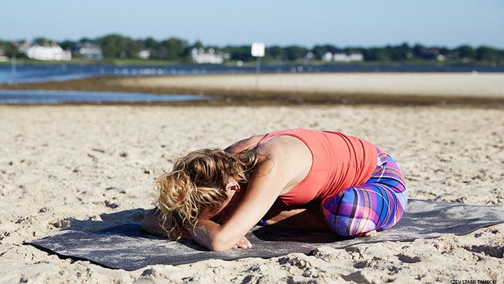 Colleen Saidman Yee performs Easy Pose with forward bend. Colleen Saidman Yee performs Easy Pose with forward bend.