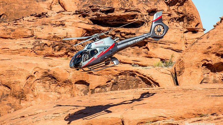 A Maverick Helicopter lands in the Valley of Fire for HeliYoga. A Maverick Helicopter lands in the Valley of Fire for HeliYoga.