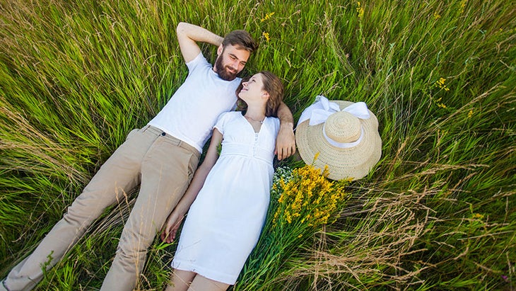 couple in grass couple in grass