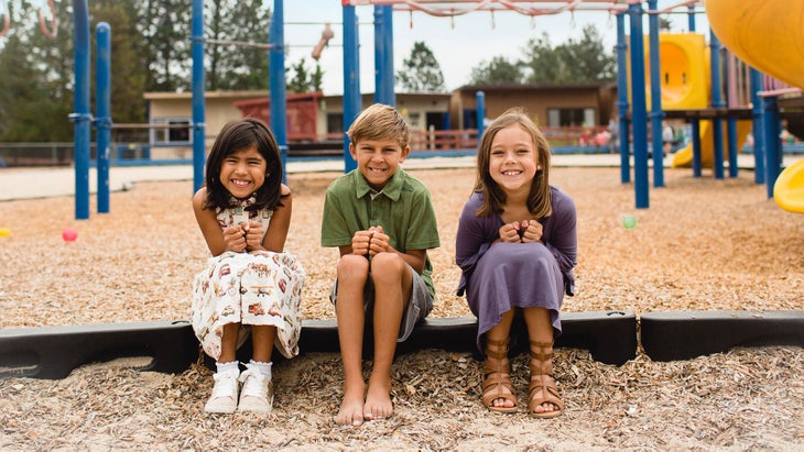 kids-sitting-1 kids sitting playground