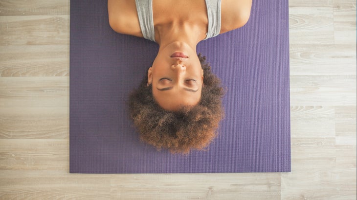 woman-savasana-yoga-nidra Yoga Nidra for Sleep.
