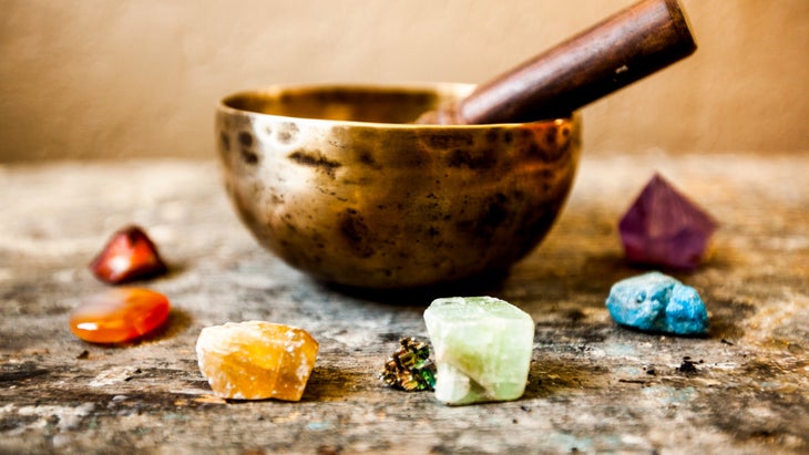 tibetan-singing-bowl-and-gemstones-picture-id531184826 None
