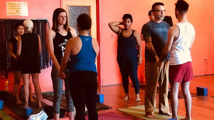 charlotte-panel-2 Yogis practice partnered eye-gazing to facilitate openness at Amplify and Activate.