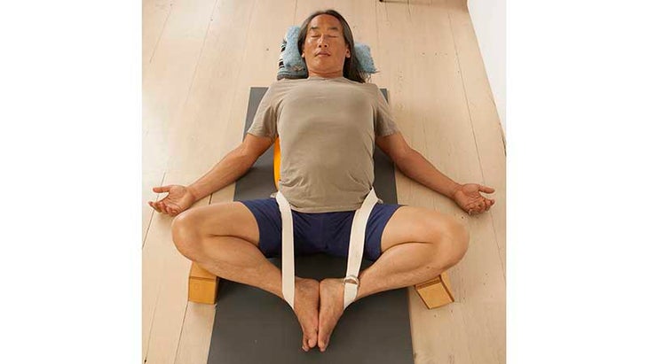 rodney-yee---reclined-cobbler-pose rodney yee, restorative yoga, cobbler pose, restorative fish pose