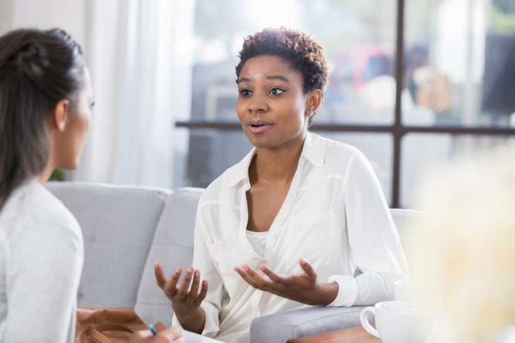 Concerned-woman-talks-with-therapist-881752052_6720x4480 (1) None