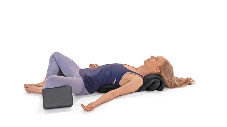 RECLINING BOUND ANGLE POSE (SUPTA BADDHA KONASANA)