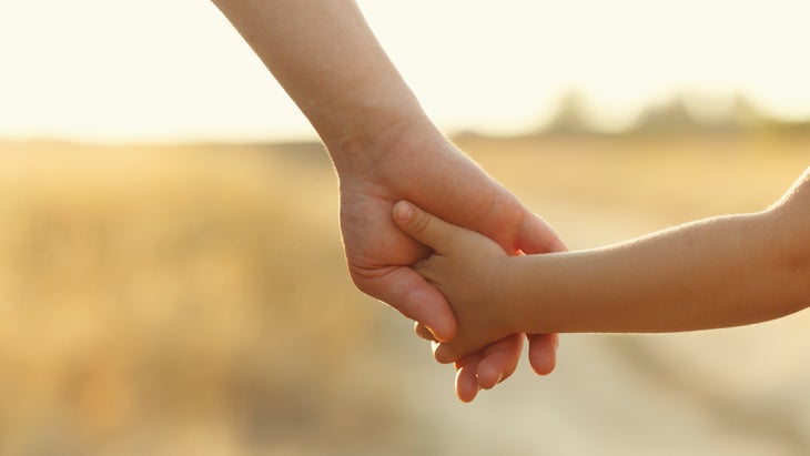 holdinghands mother daughter holding hands