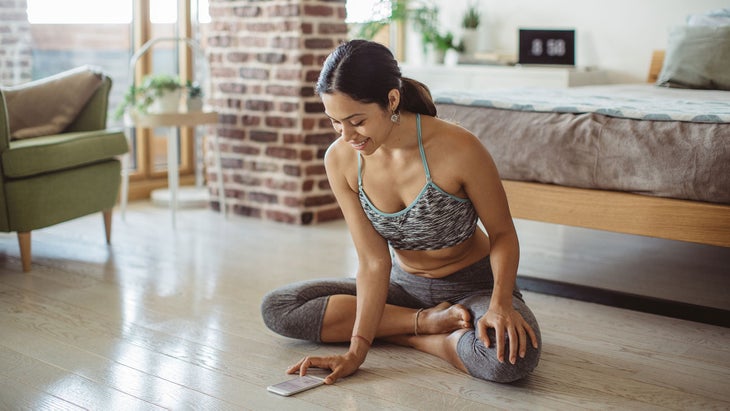 iStock-1042384992 woman on meditation app