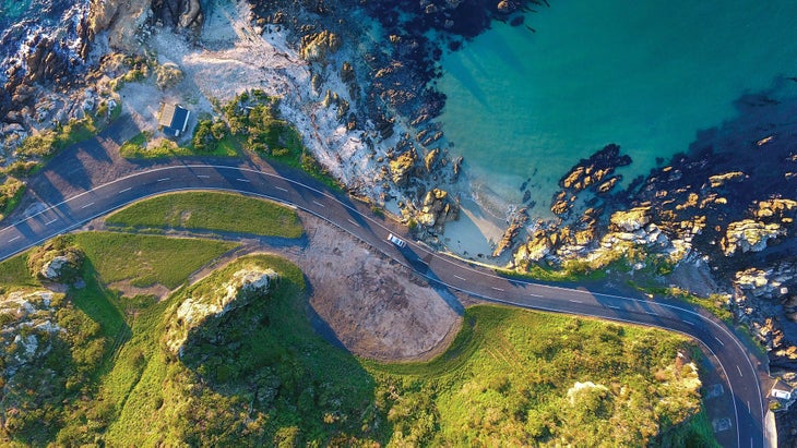 Resized-TravelDest_309_1096936_bjk Top-down view of a road along a coastline