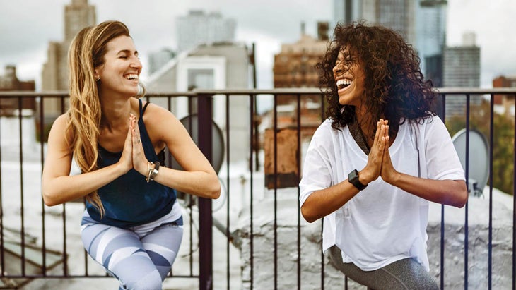Resized-TravelDest_309_867586014_bjk Two women doing yoga in New York City