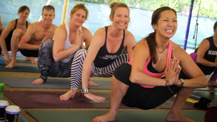 yoga class in pose frog malasana smiling and joy laughter yoga exercises, milasana, low squat